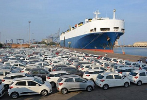 Chinese auto exports switch to container shipping